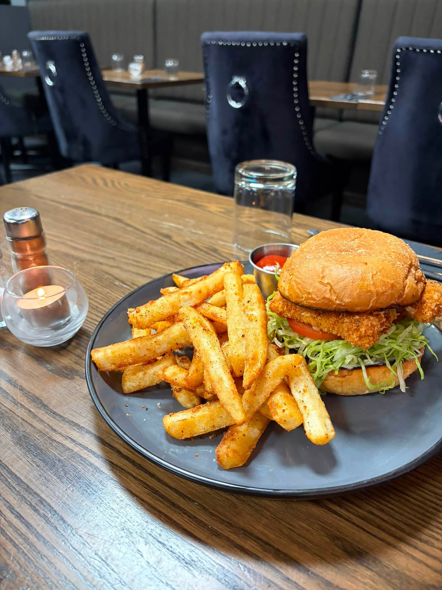 Burger and seasoned fries from The Publican Prestons